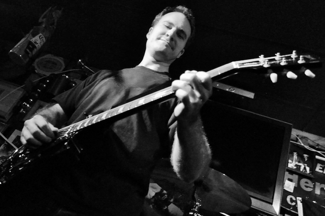 Todd Playing Guitar